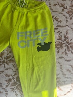 freecity Neon Yellow Graphic Joggers with Dove Logo